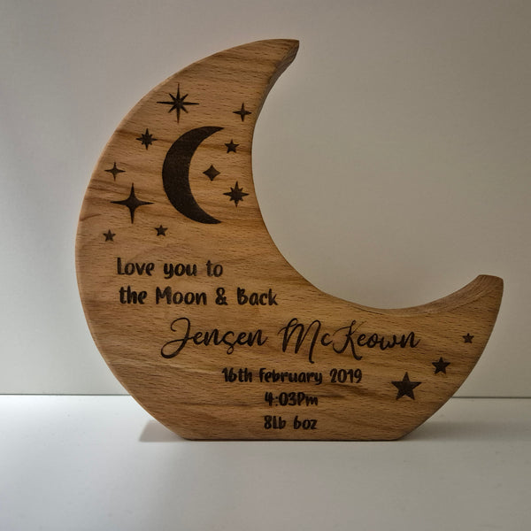 Custom Solid Beech Baby Birth Moon with personalised details including child's name, date of birth, and decorative elements