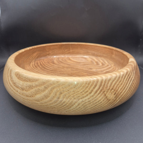 Donegal beeswax finish highlighting natural wood grain on olive ash bowl