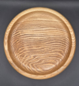 Detail of undercut rim on hand-turned olive ash bowl by Aaron McKeown Woodturning