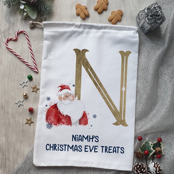 Gold santa alphabet christmas eve treat bag